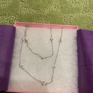 Brand new sterling silver necklace with jewels